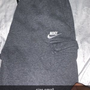 nike sweat pants with pockets on leg